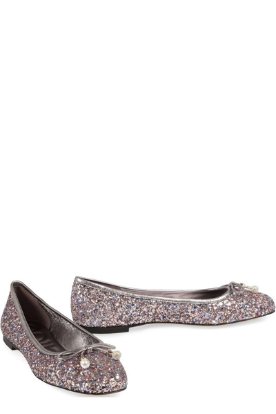 Shop Jimmy Choo Glittered Bow-embellished Flat Shoes In Argento
