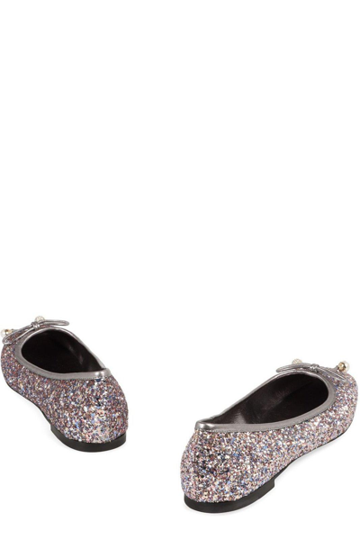 Shop Jimmy Choo Glittered Bow-embellished Flat Shoes In Argento