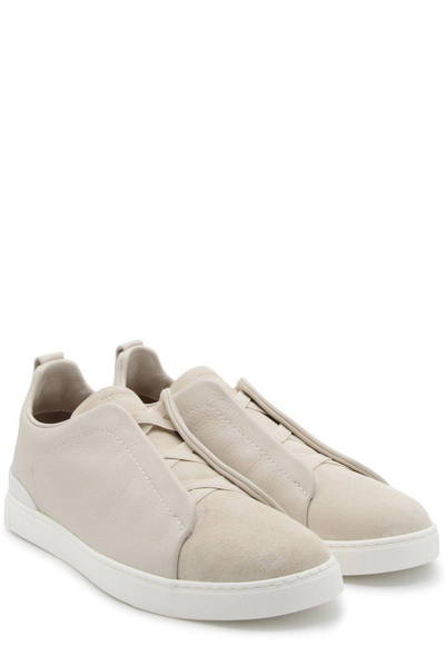 Shop Zegna Round-toe Logo-engraved Sneakers In Pan