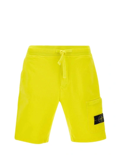 Shop Stone Island Shorts Yellow