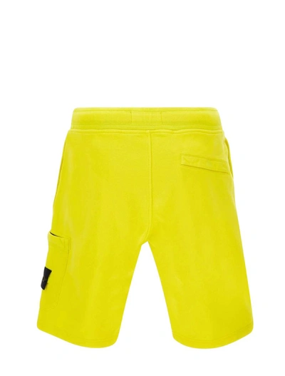 Shop Stone Island Shorts Yellow