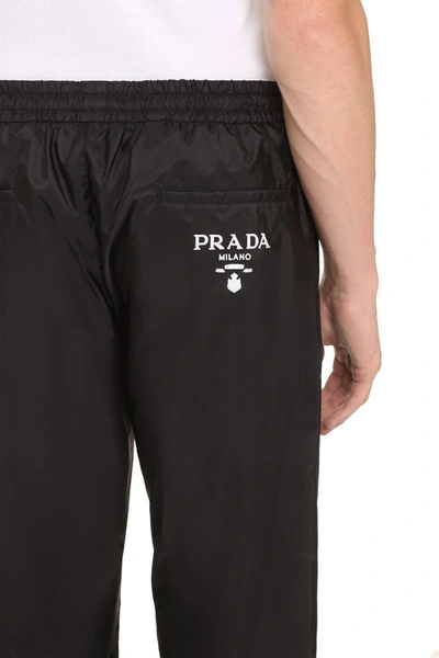Shop Prada Re-nylon Pants In Black
