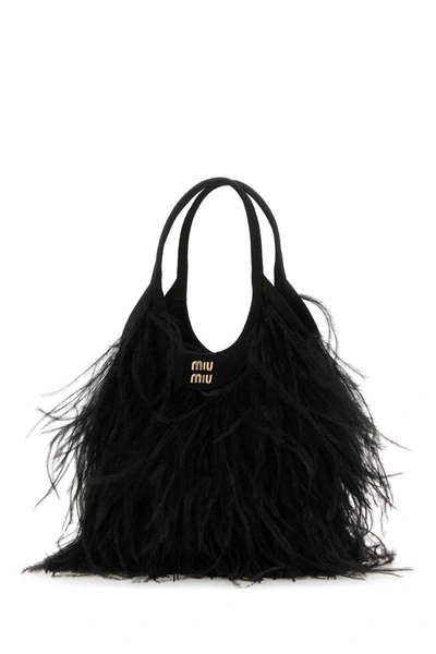 Shop Miu Miu Handbags. In Black