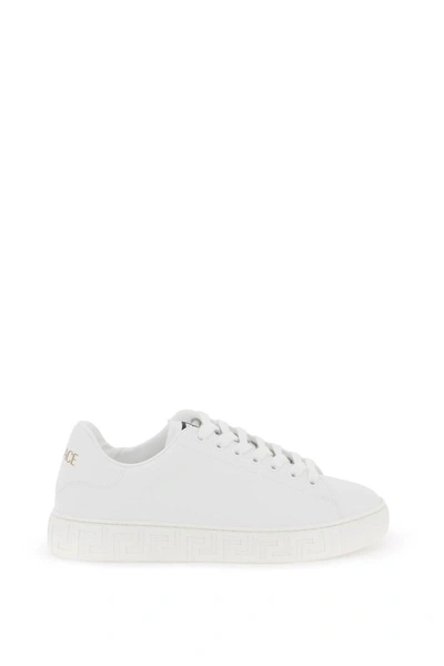 Shop Versace Greca Sneakers In White