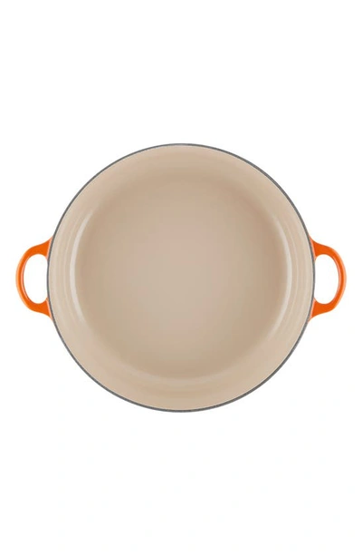 Le Creuset Volcanic Signature Round Cast-iron Casserole Dish In Flame
