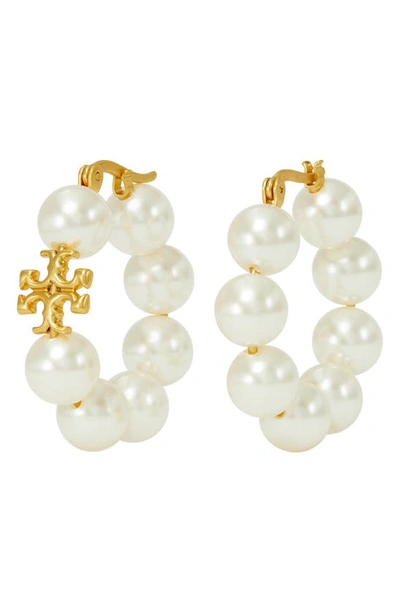 Shop Tory Burch Kira Imitation Pearl Hoop Earrings In Rolled Brass / Ivory