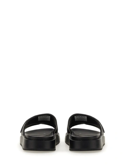 Shop Diesel Slide Sandal In Black