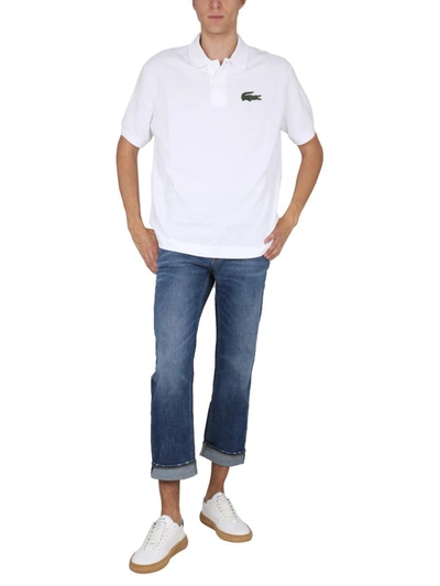 Shop Lacoste Loose Fit Polo. In White