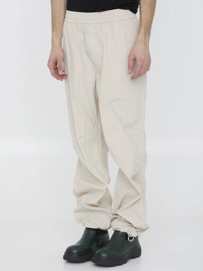Shop Burberry Cotton Blend Trousers In Cream