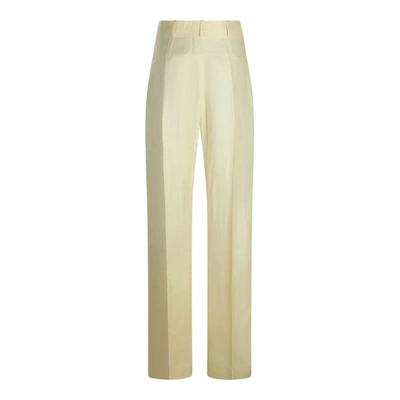 Shop Jacquemus Pants In Pale Yellow
