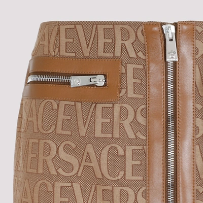 Shop Versace Miniskirt In Brown