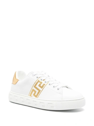 Shop Versace Leather Sneakers Shoes In White