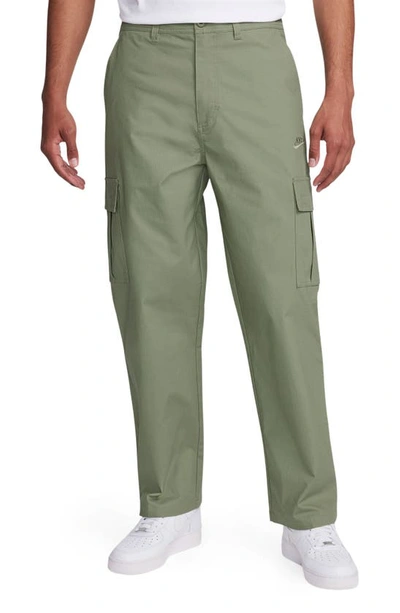 Shop Nike Club Stretch Cotton Cargo Pants In Oil Green/ Oil Green