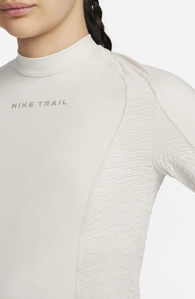 Shop Nike Trail Dri-fit Long Sleeve Running Top In Light Orewood Brown/ Khaki