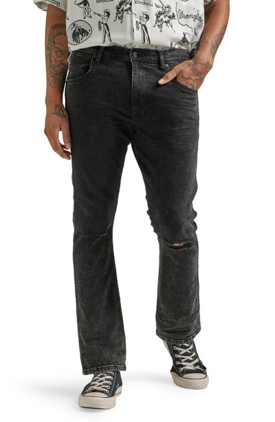 Shop Wrangler Ripped Bootcut Jeans In Hard Days Nights