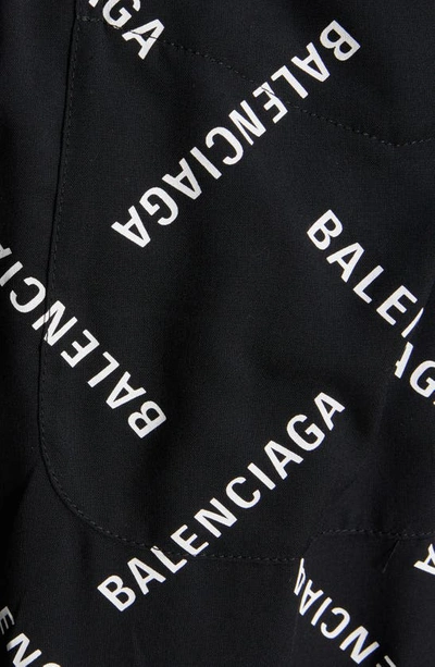 Shop Balenciaga Logo Print Wide Leg Pants In Black/ White