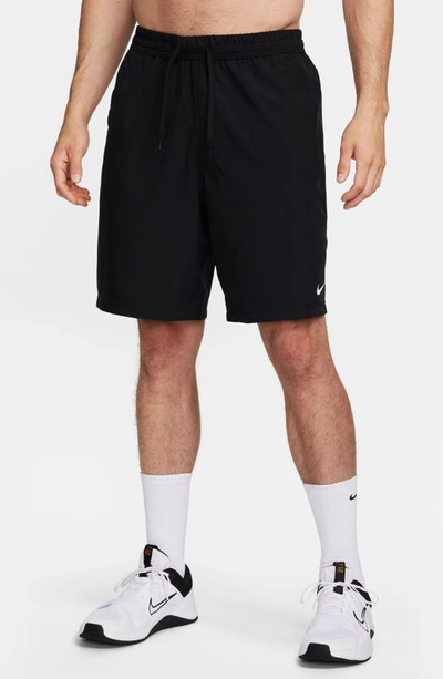 Shop Nike Form Dri-fit 9-inch Unlined Versatile Shorts In Black/ White