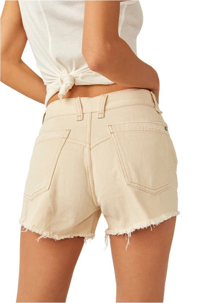 Free People Now Or Never Ripped Denim Cutoff Shorts In Ecru