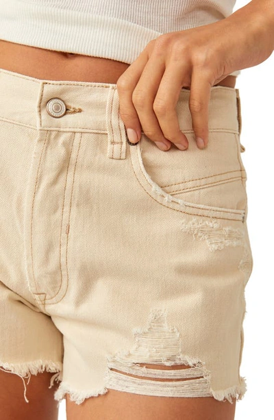 Free People Now Or Never Ripped Denim Cutoff Shorts In Ecru