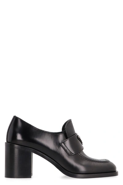Shop Prada Heeled Loafers In Black