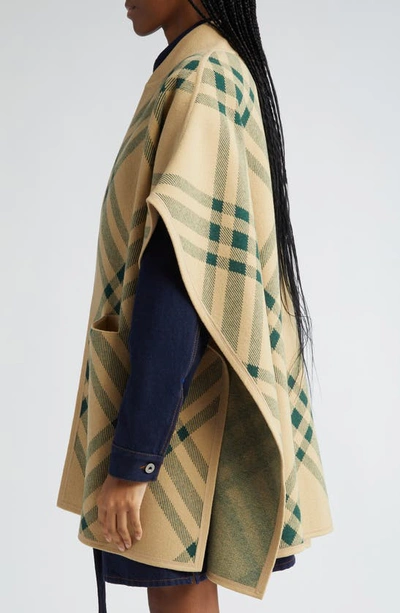 Shop Burberry Check Wool Blend Sweater Cape In Flax / Ivy
