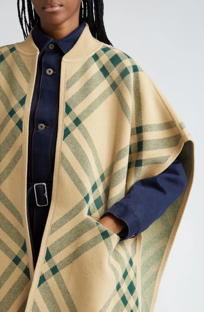 Shop Burberry Check Wool Blend Sweater Cape In Flax / Ivy