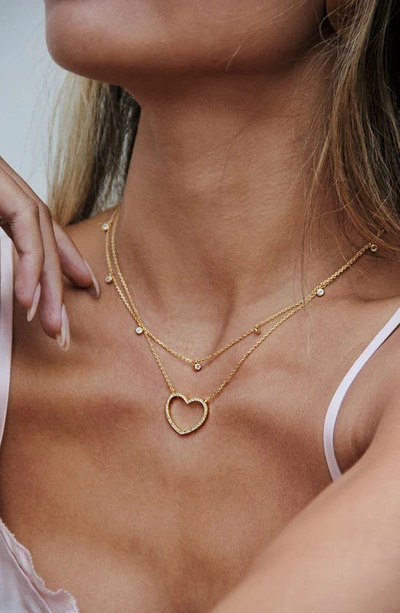 Shop Ettika Dainty Heart Set Of 2 Pendant Necklaces In Gold