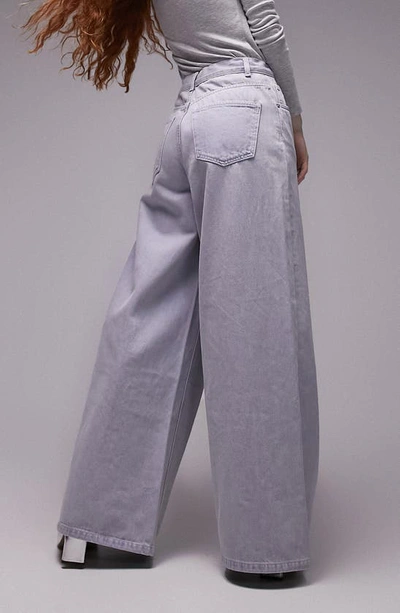 Shop Topshop Paperbag Bow Waist Wide Leg Jeans In Mid Blue
