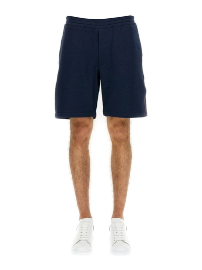 Shop Alexander Mcqueen Bermuda Shorts With Selvedge Logo Band In Blue
