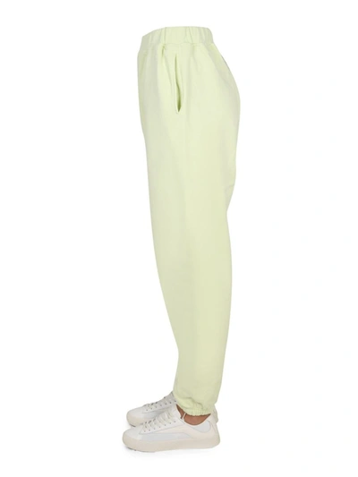Shop Aries Jogging Pants With Logo Print Unisex In Green