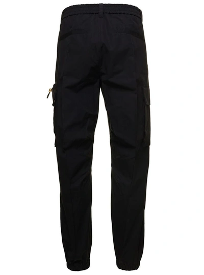 Shop Versace Black Cargo Pants With Drawstring In Cotton Woman