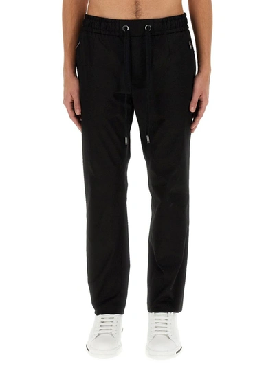 Shop Dolce & Gabbana Jogging Pants With Plaque In Black