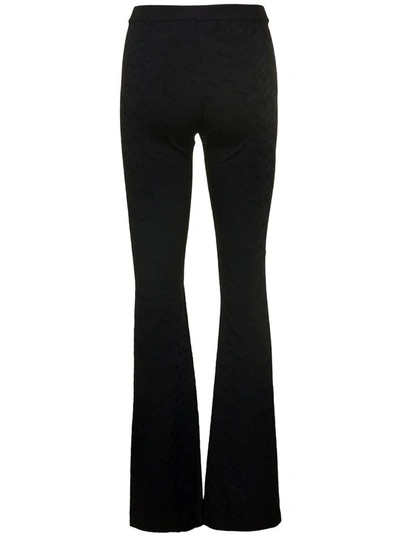 Shop Versace Knit Colour Allover Pants In Black