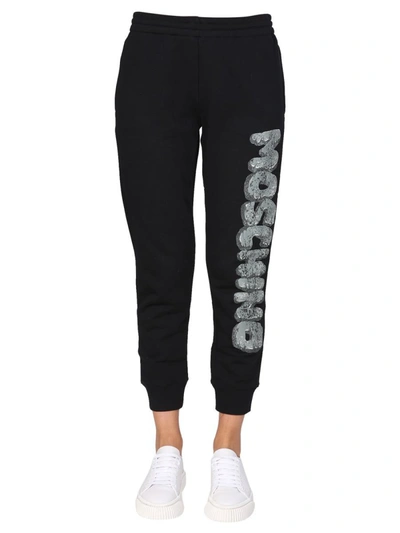 Shop Moschino Jogging Pants In Black