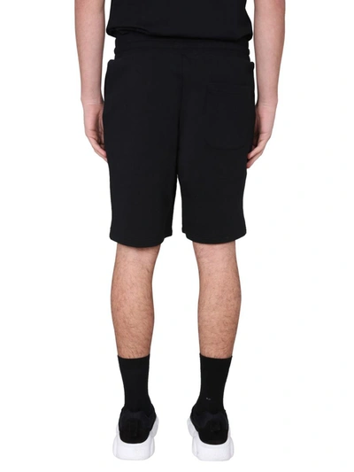 Shop Moschino Logo Print Shorts In Black