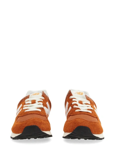 Shop New Balance Sneaker 574 In Orange