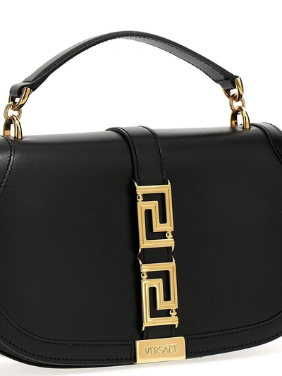 Shop Versace 'greca' Handbag In Black