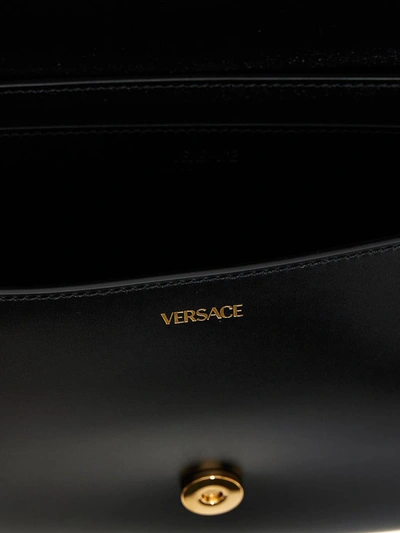 Shop Versace 'greca' Handbag In Black