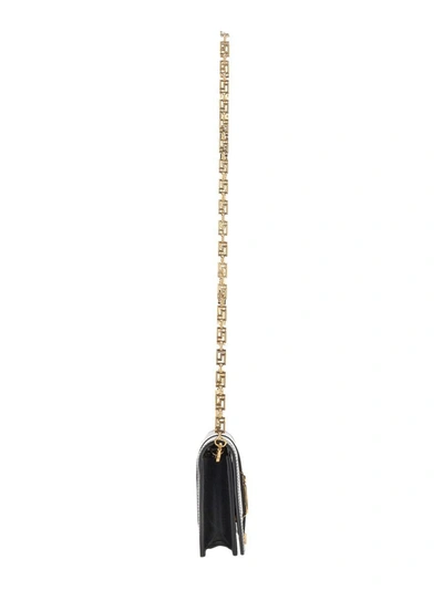 Shop Versace Mini "greca Goddess" Bag In Black