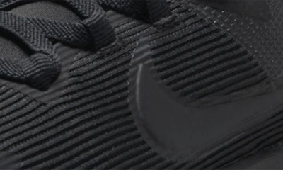 Shop Nike Kids' Star Runner 4 Nn Gs Sneaker In Black/ Black/ Anthracite