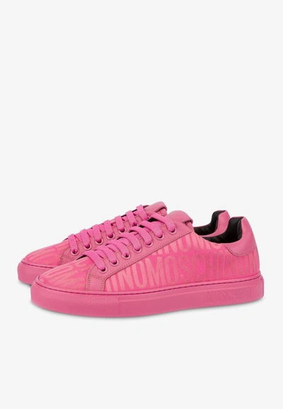 Shop Moschino All-over Logo Low-top Sneakers In Pink