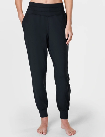 Shop Sweaty Betty Gaia Yoga Pants In Black