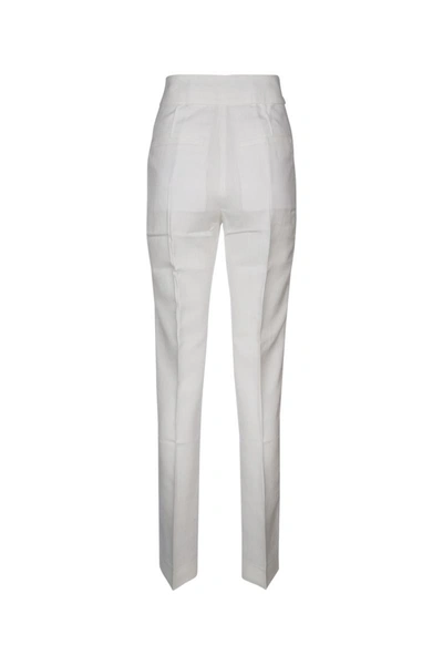 Shop Jacquemus Pants In White