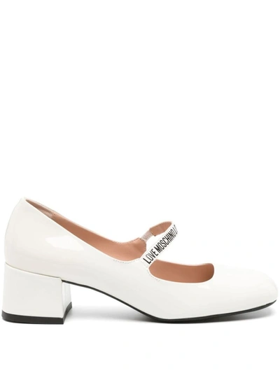 Shop Love Moschino Painted Pumps In White