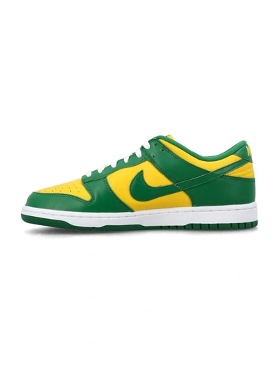 Shop Nike Sp Qs Nike Dunk Low Sp Sneakers In Varsity Maize/pine Green-white