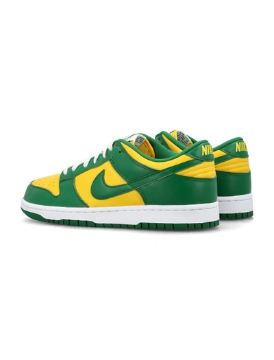 Shop Nike Sp Qs Nike Dunk Low Sp Sneakers In Varsity Maize/pine Green-white