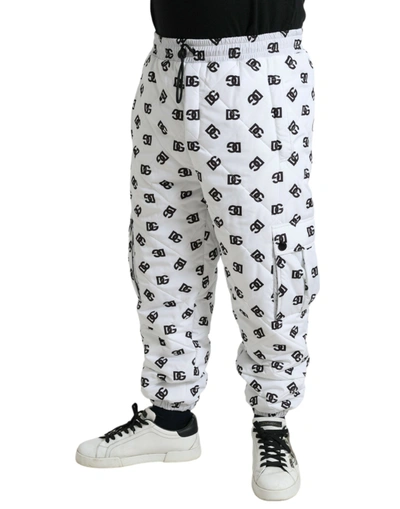 Shop Dolce & Gabbana Chic White Jogger Pants With Iconic Dg Men's Print