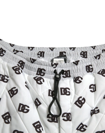 Shop Dolce & Gabbana Chic White Jogger Pants With Iconic Dg Men's Print