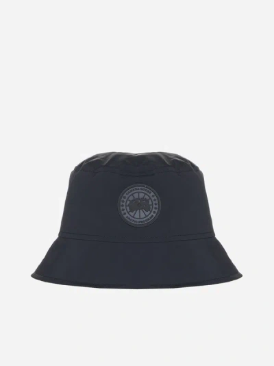 Shop Canada Goose Horizon Reversible Nylon Bucket Hat In Black,northstar White