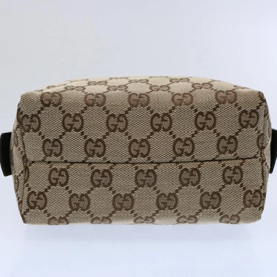 Shop Gucci Beige Canvas Clutch Bag ()